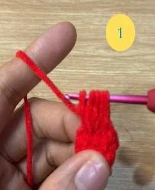 Working the bobble stitch thumb