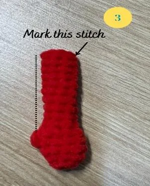 Marking the stitch opposite the thumb