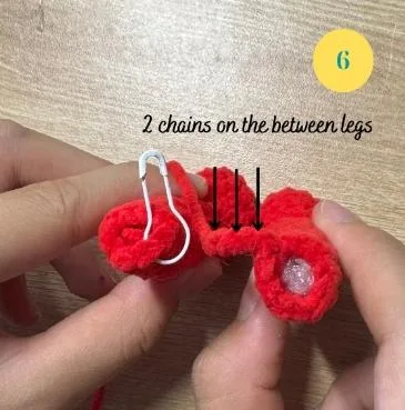 Two chains between the legs